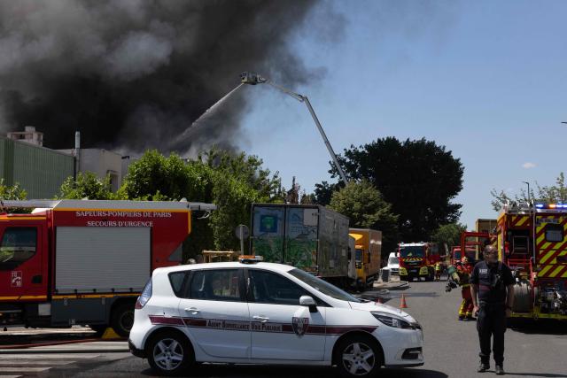 Firefighters work to extinguish a fire at an industrial facility in Bobigny, north of Paris, on June 17, 2026. (Photo by JOEL SAGET / AFP)