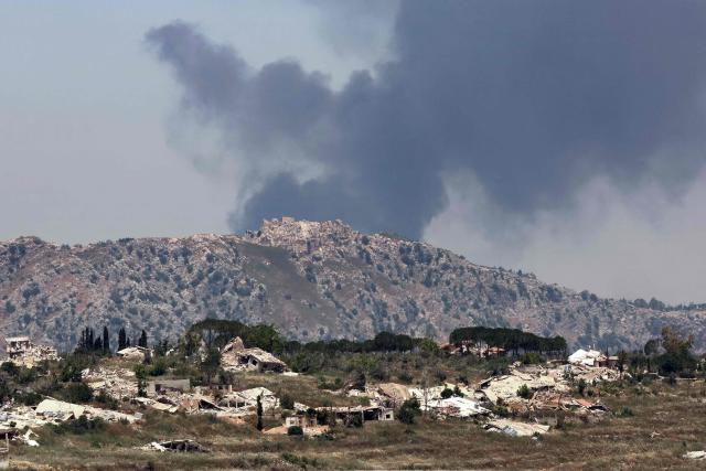 This picture taken from a position in the Upper Galilee in northern Israel, near the Israel-Lebanon border on June 17, 2026, shows smoke billowing in the distance behind the medieval Beaufort Castle in southern Lebanon, known locally as Qalaat al-Shaqif or Shaqif Arnoun, that was captured by Israeli forces last month. Lebanon and Israel have been holding direct talks in Washington since April, seeking to end the hostilities between Israel and Hezbollah and separate their conflict from the wider regional war. (Photo by JACK GUEZ / AFP)