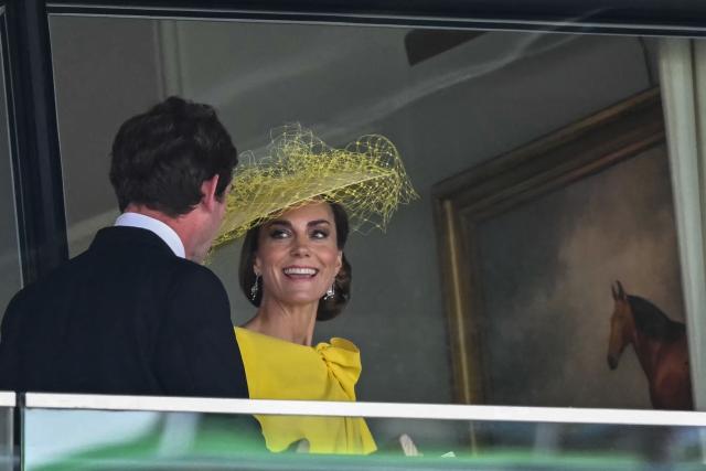 Britain's Catherine, Princess of Wales (R) smiles from one of the boxes on the second day of the Royal Ascot horse racing meeting in Ascot, west of London, on June 17, 2026. (Photo by JUSTIN TALLIS / AFP)