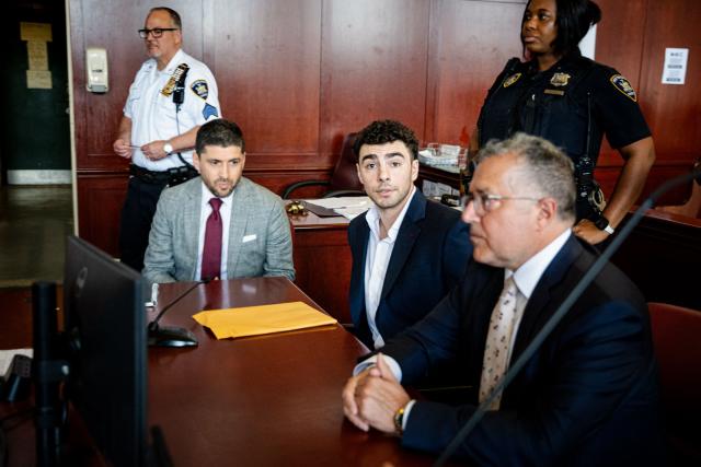 Luigi Mangione (C), accused of the murder of United Healthcare CEO Brian Thompson, appears for a pre-trial hearing at Manhattan Criminal Court in New York, on June 17, 2026. (Photo by Angelina Katsanis / POOL / AFP)