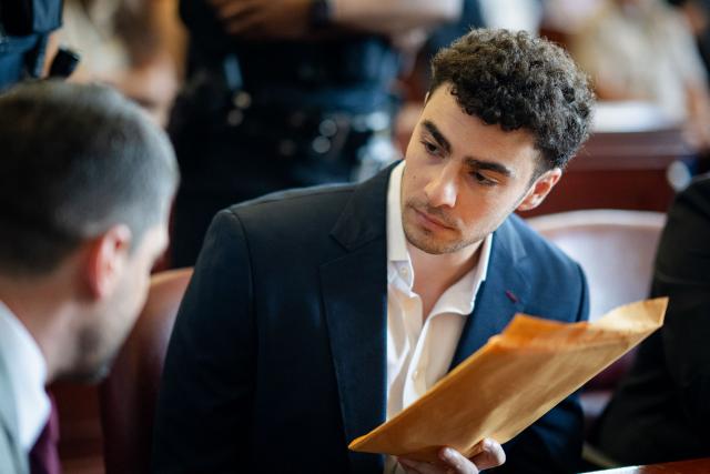 Luigi Mangione, accused of the murder of United Healthcare CEO Brian Thompson, appears for a pre-trial hearing at Manhattan Criminal Court in New York, on June 17, 2026. (Photo by Angelina Katsanis / POOL / AFP)