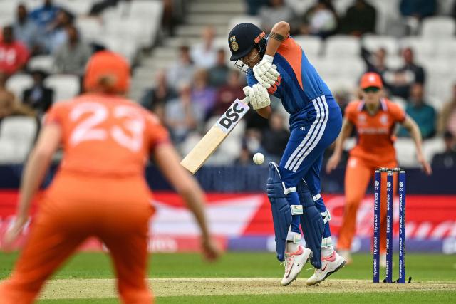 India's Shafali Verma (C) plays a shot during the ICC Women's T20 cricket world cup 2026 game between India and The Netherlands, at Headingley in Leeds, northern England on June 17, 2026. (Photo by Oli SCARFF / AFP)
