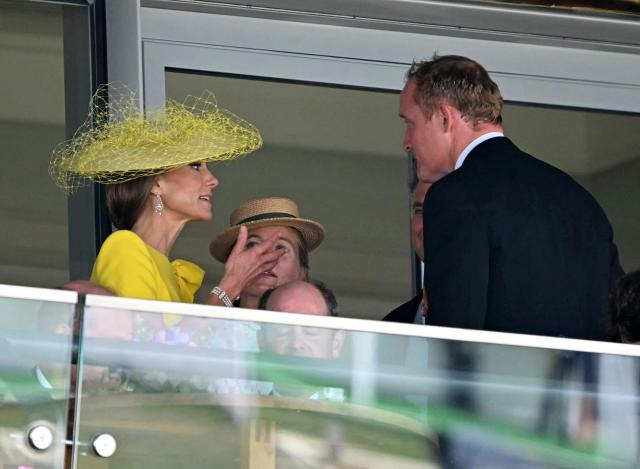Britain's Catherine, Princess of Wales (L) talks with guests on the second day of the Royal Ascot horse racing meeting in Ascot, west of London, on June 17, 2026. (Photo by JUSTIN TALLIS / AFP)