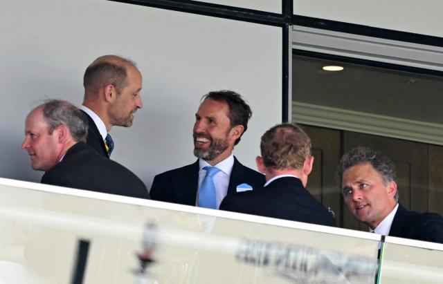 Britain's Prince William, Prince of Wales talks with former England football manager Gareth Southgate on the second day of the Royal Ascot horse racing meeting in Ascot, west of London, on June 17, 2026. (Photo by JUSTIN TALLIS / AFP)