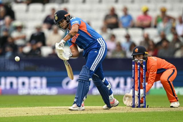 India's Shafali Verma (L) plays a shot during the ICC Women's T20 cricket world cup 2026 game between India and The Netherlands, at Headingley in Leeds, northern England on June 17, 2026. (Photo by Oli SCARFF / AFP)