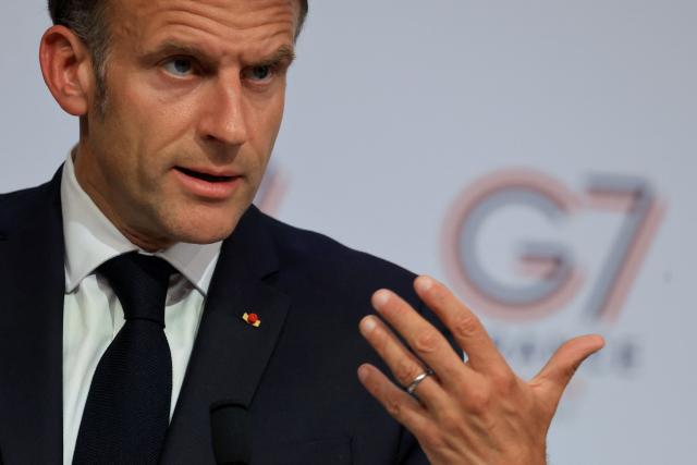 France's President Emmanuel Macron speaks during the closing press conference of the G7 summit, in Evian, eastern France, on June 17, 2026. A G7 summit is set to take place June 15 to 17 in the French town of Evian-les-Bains near Switzerland and it will be attended by country leaders as well as the EU's foreign policy chief and ministers from Brazil, Canada, the United Arab Emirates and Turkey. (Photo by Ludovic MARIN / AFP)