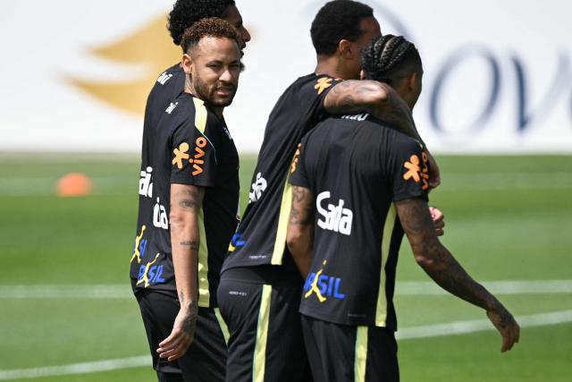 Brazil's forward #10 Neymar (L) takes part in a training session ahead of Brazil's 2026 World Cup football tournament Group C football match against Haiti in Morris Township on June 17, 2026.  (Photo by MAURO PIMENTEL / AFP)