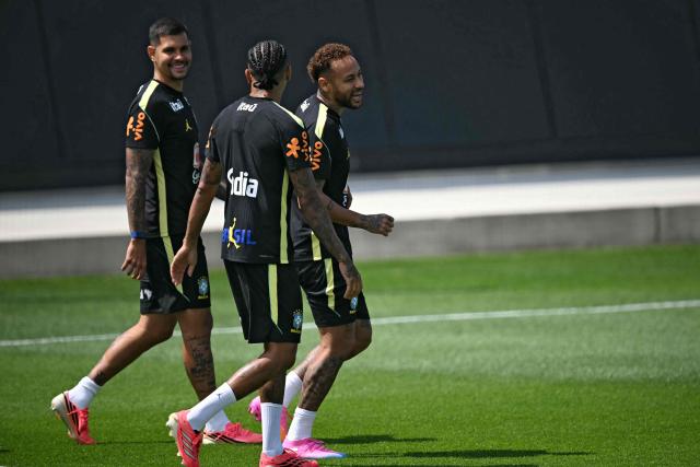 Brazil's forward #10 Neymar (R) takes part in a training session ahead of Brazil's 2026 World Cup football tournament Group C football match against Haiti in Morris Township on June 17, 2026.  (Photo by MAURO PIMENTEL / AFP)