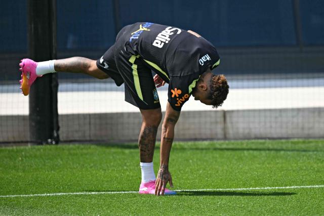 Brazil's forward #10 Neymar (C) takes part in a training session ahead of Brazil's 2026 World Cup football tournament Group C football match against Haiti in Morris Township on June 17, 2026.  (Photo by MAURO PIMENTEL / AFP)
