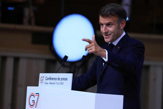 France's President Emmanuel Macron gestures as he speaks during the closing press conference of the G7 summit, in Evian, eastern France, on June 17, 2026. A G7 summit is set to take place June 15 to 17 in the French town of Evian-les-Bains near Switzerland and it will be attended by country leaders as well as the EU's foreign policy chief and ministers from Brazil, Canada, the United Arab Emirates and Turkey. (Photo by Ludovic MARIN / AFP)