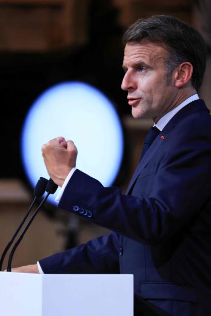 France's President Emmanuel Macron gestures as he speaks during the closing press conference of the G7 summit, in Evian, eastern France, on June 17, 2026. A G7 summit is set to take place June 15 to 17 in the French town of Evian-les-Bains near Switzerland and it will be attended by country leaders as well as the EU's foreign policy chief and ministers from Brazil, Canada, the United Arab Emirates and Turkey. (Photo by Ludovic MARIN / AFP)