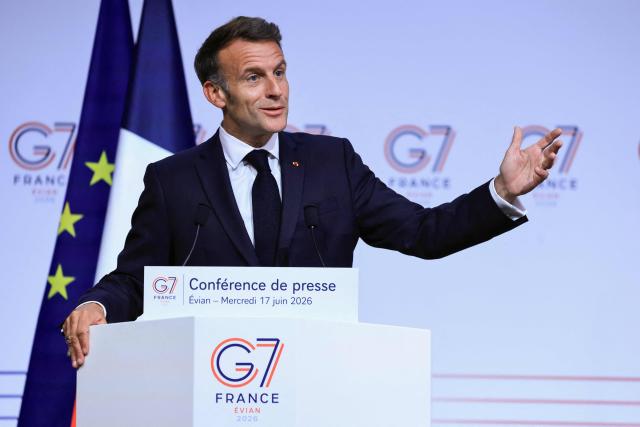 France's President Emmanuel Macron gestures as he speaks during the closing press conference of the G7 summit, in Evian, eastern France, on June 17, 2026. A G7 summit is set to take place June 15 to 17 in the French town of Evian-les-Bains near Switzerland and it will be attended by country leaders as well as the EU's foreign policy chief and ministers from Brazil, Canada, the United Arab Emirates and Turkey. (Photo by Ludovic MARIN / AFP)