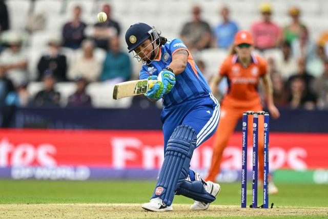 India's Richa Ghosh hits a six during the ICC Women's T20 cricket world cup 2026 game between India and The Netherlands, at Headingley in Leeds, northern England on June 17, 2026. (Photo by Oli SCARFF / AFP)