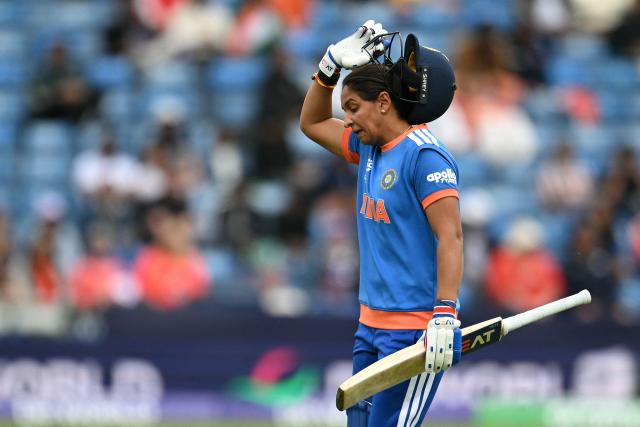 India's captain Harmanpreet Kaur walks off after being dismissed during the ICC Women's T20 cricket world cup 2026 game between India and The Netherlands, at Headingley in Leeds, northern England on June 17, 2026. (Photo by Oli SCARFF / AFP)