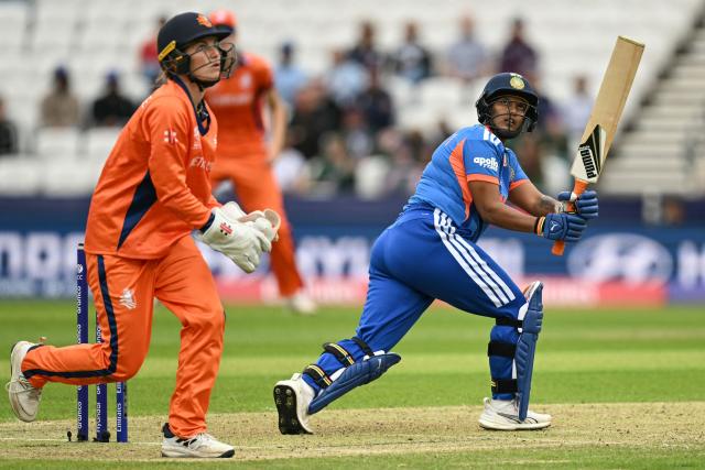 India's Deepti Sharma (R) watches as she hits a six during the ICC Women's T20 cricket world cup 2026 game between India and The Netherlands, at Headingley in Leeds, northern England on June 17, 2026. (Photo by Oli SCARFF / AFP)