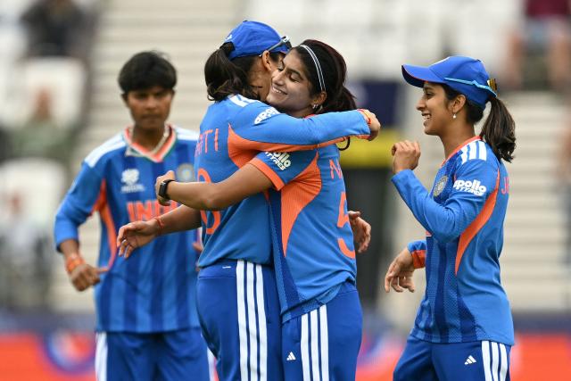 India celebrate the dismissal of Netherlands' Heather Siegers (not pictured) during the ICC Women's T20 cricket world cup 2026 game between India and The Netherlands, at Headingley in Leeds, northern England on June 17, 2026. (Photo by Oli SCARFF / AFP)
