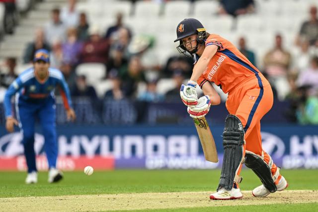 Netherlands' Phebe Molkenboer (R) plays a shot during the ICC Women's T20 cricket world cup 2026 game between India and The Netherlands, at Headingley in Leeds, northern England on June 17, 2026. (Photo by Oli SCARFF / AFP)