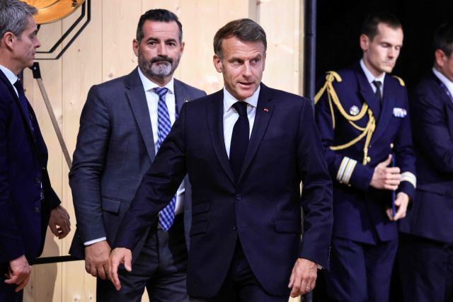 France's President Emmanuel Macron arrives for the closing press conference of the G7 summit, in Evian, eastern France, on June 17, 2026. A G7 summit is set to take place June 15 to 17 in the French town of Evian-les-Bains near Switzerland and it will be attended by country leaders as well as the EU's foreign policy chief and ministers from Brazil, Canada, the United Arab Emirates and Turkey. (Photo by Ludovic MARIN / AFP)