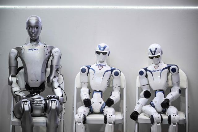 Robots of Unitree Robotics company are displayed at the VivaTech technology startups and innovation fair at the Paris Expo Porte de Versailles, in Paris on June 17, 2026. (Photo by JULIEN DE ROSA / AFP)