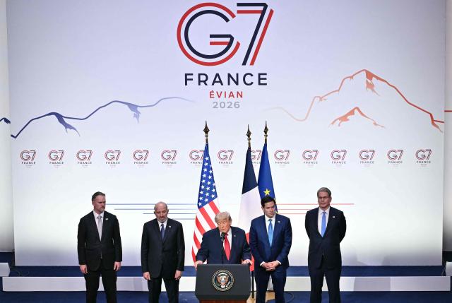 US President Donald Trump (C) addresses the media alongside US Secretary of State Marco Rubio (2R) and US Commerce secretary Howard Lutnick (2L) during a closing press conference at the G7 summit, in Evian, eastern France, on June 17, 2026. A G7 summit is set to take place June 15 to 17 in the French town of Evian-les-Bains near Switzerland and it will be attended by country leaders as well as the EU's foreign policy chief and ministers from Brazil, Canada, the United Arab Emirates and Turkey. (Photo by Mandel NGAN / AFP)