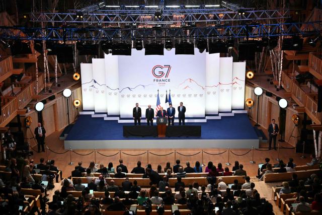 US President Donald Trump (C) addresses the media alongside US Secretary of State Marco Rubio (2R) and US Commerce secretary Howard Lutnick (2L) during a closing press conference at the G7 summit, in Evian, eastern France, on June 17, 2026. A G7 summit is set to take place June 15 to 17 in the French town of Evian-les-Bains near Switzerland and it will be attended by country leaders as well as the EU's foreign policy chief and ministers from Brazil, Canada, the United Arab Emirates and Turkey. (Photo by Mandel NGAN / AFP)