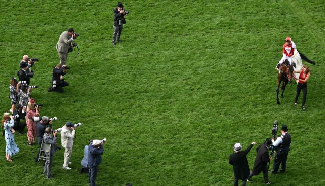 Jockey Harry Davies celebrates on Rogue Diplomat after riding to win the Royal Hunt Cup horse race on the second day of the Royal Ascot horse racing meeting in Ascot, west of London, on June 17, 2026. (Photo by JUSTIN TALLIS / AFP)