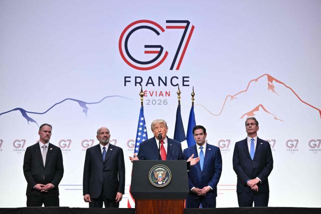 US President Donald Trump (C) gestures as he addresses the media alongside United States Trade Representative Jamieson Greer (L), US Commerce secretary Howard Lutnick (2L), US Secretary of State Marco Rubio (2R) and US Secretary of Treasury Scott Bessent during a closing press conference at the G7 summit, in Evian, eastern France, on June 17, 2026. A G7 summit is set to take place June 15 to 17 in the French town of Evian-les-Bains near Switzerland and it will be attended by country leaders as well as the EU's foreign policy chief and ministers from Brazil, Canada, the United Arab Emirates and Turkey. (Photo by Mandel NGAN / AFP)