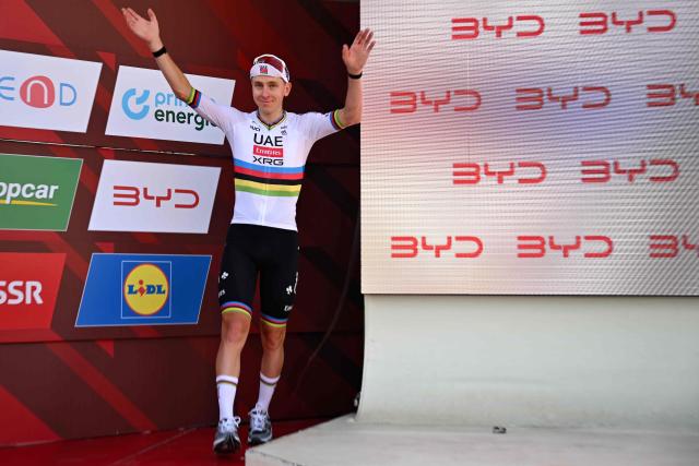 Slovenia's rider Tadej Pogacar of team UAE Emirates - XRG celebrates on the podium of the first stage of the Men's Tour of Switzerland (Tour de Suisse) cycling race, in Sondrio, Italy, on June 17, 2026. (Photo by Marco BERTORELLO / AFP)