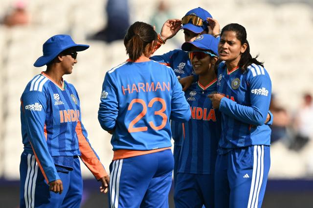 India plays celebrate their victory during the ICC Women's T20 cricket world cup 2026 game between India and The Netherlands, at Headingley in Leeds, northern England on June 17, 2026. (Photo by Oli SCARFF / AFP)