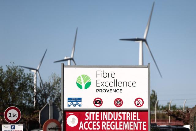 (FILES) This photograph shows the logo of Fibre Excellence at the entrance of the industrial site in Tarascon, south-eastern France on April 14, 2026, as two sites in Tarascon and Saint-Gaudens face closure. The Toulouse commercial court postponed on June 17, 2026 until July 6 the examination of the takeover offer for paper pulp manufacturer Fibre Excellence, because a new investor "of renown" has expressed its interest in joining the project. (Photo by Thibaud MORITZ / AFP)