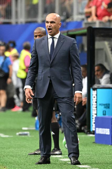 Portugal's Spanish head coach Roberto Martinez reatcs  from the touch line  during the 2026 World Cup Group K football match between Portugal and the Democratic Republic of Congo at the Houston Stadium in Houston on June 17, 2026.  (Photo by RONALDO SCHEMIDT / AFP)