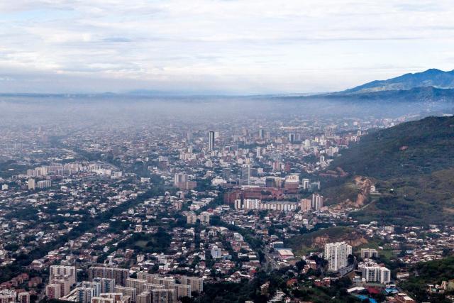 Aerial view of Cali, Colombia, on June 17, 2026. Colombians vote on June 21, 2026 in a presidential runoff pitting a hard-right opera-singer-turned-lawyer against a leftist senator, an election with stark consequences for the country's stumbling peace process with armed groups and strained ties with Washington. (Photo by JOAQUIN SARMIENTO / AFP)