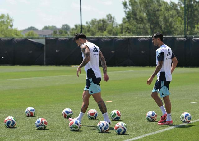 Argentina's midfielders #05 Leandro Paredes (L) and #14 Exequiel Palacios walk on the pitch during training session at Sporting KC Training Centre in Kansas City on June 17, 2026. (Photo by JUAN MABROMATA / AFP)