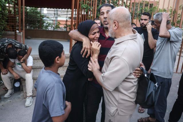Displaced Palestinians mourn loved ones killed in an Israeli airstrike during a funeral at Nasser Hospital in Khan Yunis, in the southern Gaza Strip, on June 17, 2026. A ceasefire has been in place in Gaza since October, but Israel reserves the right to strike targets it deems a threat. The territory remains gripped by daily violence as Israeli strikes continue, with both the military and Hamas accusing one another of violating the truce. (Photo by Bashar Taleb / AFP)