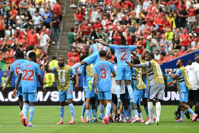 DR Congo players celebrate   their first goal during the 2026 World Cup Group K football match between Portugal and the Democratic Republic of Congo at the Houston Stadium in Houston on June 17, 2026.  (Photo by RONALDO SCHEMIDT / AFP)