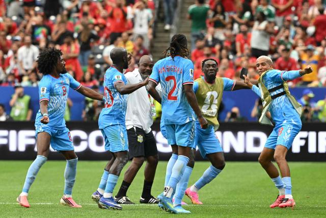 DR Congo players celebrate   their first goal during the 2026 World Cup Group K football match between Portugal and the Democratic Republic of Congo at the Houston Stadium in Houston on June 17, 2026.  (Photo by RONALDO SCHEMIDT / AFP)