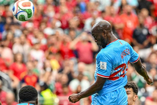 Congo DR's forward #20 Yoane Wissa heads the ball and scores his team's first goal during the 2026 World Cup Group K football match between Portugal and the Democratic Republic of Congo at the Houston Stadium in Houston on June 17, 2026. Mexico and South Korea will meet a 2026 World Cup Group A football match at the Guadalajara Stadium in Zapopan on June 18, 2026. (Photo by RONALDO SCHEMIDT / AFP)