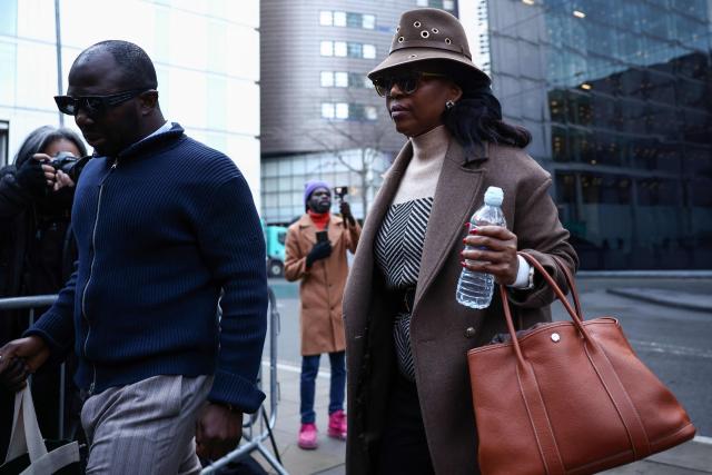 (FILES) Former OPEC president Diezani Alison-Madueke (R) arrives to attend her ongoing corruption trial at the Southwark Crown Court in London on January 28, 2026. The first woman president of OPEC and Nigeria's former oil minister, Diezani Alison-Madueke, was cleared of bribery charges in a UK trial on June 18, 2026, her defence lawyers said in a statement. (Photo by Henry NICHOLLS / AFP)