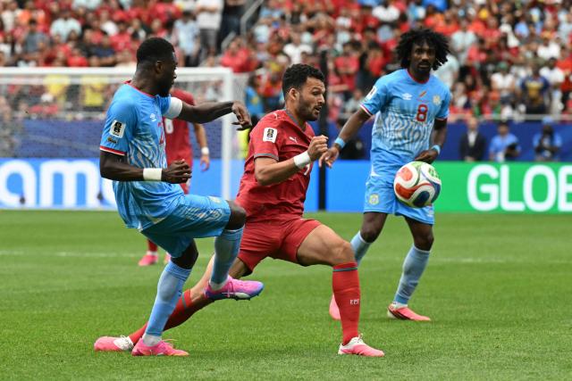 Portugal's forward #09 Goncalo Ramos (C) fights for the ball with Congo DR's defender #22 Chancel Mbemba (L)  during the 2026 World Cup Group K football match between Portugal and the Democratic Republic of Congo at the Houston Stadium in Houston on June 17, 2026.  (Photo by RONALDO SCHEMIDT / AFP)