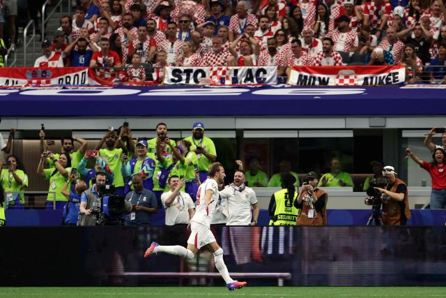 TOPSHOT - England's forward #09 Harry Kane celebrates after scoring a goal during the 2026 World Cup Group L football match between England and Croatia at the Dallas Stadium in Arlington on June 17, 2026.  (Photo by Aric Becker / AFP)