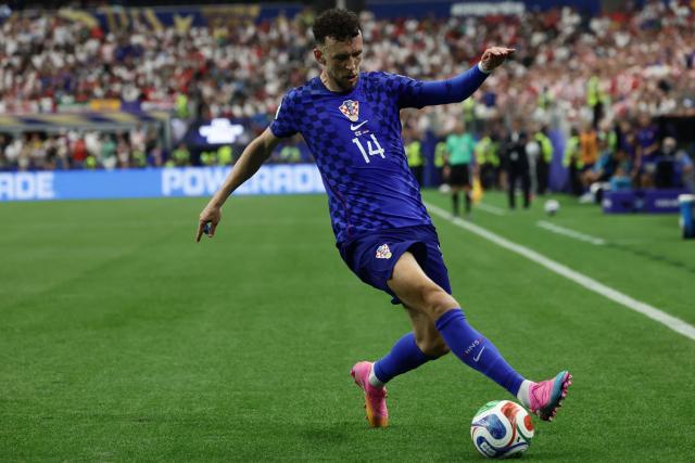 Croatia's forward #14 Ivan Perisic controls the ball during the 2026 World Cup Group L football match between England and Croatia at the Dallas Stadium in Arlington on June 17, 2026.  (Photo by Aric Becker / AFP)
