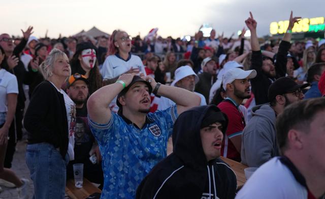 England supporters react as they watch the 2026 World Cup Group L football match between England and Croatia, at the 4TheFans Fan Park in Brighton, southern England on June 17, 2026. (Photo by CARLOS JASSO / AFP)