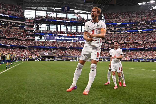 England's forward #09 Harry Kane celebrates after scoring his team's second goal during the 2026 World Cup Group L football match between England and Croatia at the Dallas Stadium in Arlington on June 17, 2026.  (Photo by Paul ELLIS / AFP)