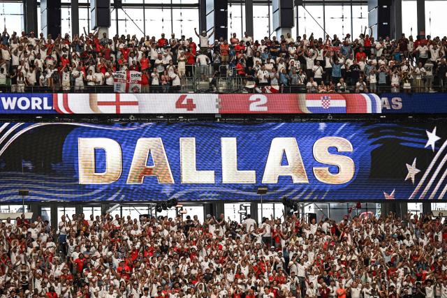 England supporters cheer after their team won the  2026 World Cup Group L football match between England and Croatia at the Dallas Stadium in Arlington on June 17, 2026.  (Photo by Paul ELLIS / AFP)