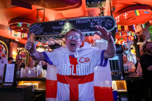An England fan reacts as they watch the 2026 World Cup football tournament between England and Croatia at a bar in the Brooklyn borough of New York City, on June 17, 2026. (Photo by ANGELA WEISS / AFP)
