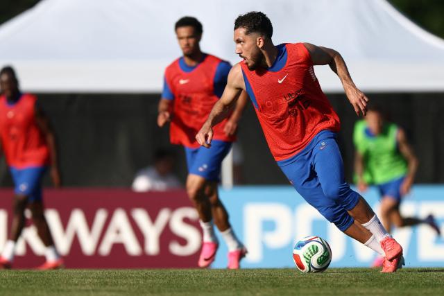 France's forward #24 Rayan Cherki plays with a ball during a training session at Bentley University, the team's base camp, during the 2026 World Cup football tournament in Waltham, near Boston, on June 17, 2026. (Photo by FRANCK FIFE / AFP)
