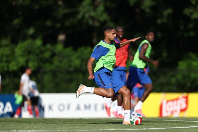 France's defender #26 Maxence Lacroix kicks the ball during a training session at Bentley University, the team's base camp, during the 2026 World Cup football tournament in Waltham, near Boston, on June 17, 2026. (Photo by FRANCK FIFE / AFP)