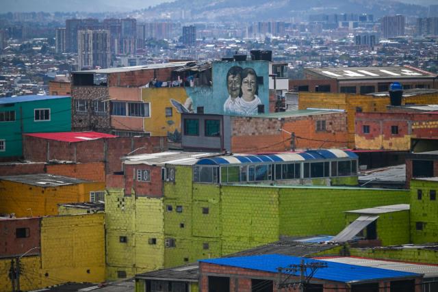 This image shows lower-middle-income housing at Ciudad Bolivar neighbourhood, in southern Bogota, on June 17, 2026. Colombians vote on June 21, 2026 in a presidential runoff pitting a hard-right opera-singer-turned-lawyer against a leftist senator, an election with stark consequences for the country's stumbling peace process with armed groups and strained ties with Washington. (Photo by Juan BARRETO / AFP)