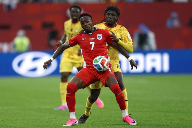 Panama's midfielder #07 Jose Luis Rodriguez and Ghana's midfielder #03 Caleb Yirenkyi fight for the ball during the 2026 World Cup Group L football match between Ghana and Panama at the Toronto Stadium in Toronto on June 17, 2026.  (Photo by Cole Burston / AFP)