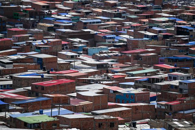 This image shows Ciudad Bolivar neighbourhood, in southern Bogota, on June 17, 2026. Colombians vote on June 21, 2026 in a presidential runoff pitting a hard-right opera-singer-turned-lawyer against a leftist senator, an election with stark consequences for the country's stumbling peace process with armed groups and strained ties with Washington. (Photo by Juan BARRETO / AFP)